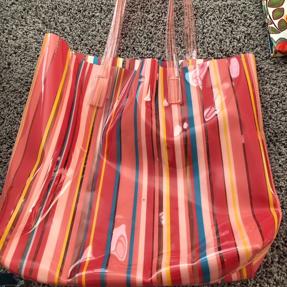 Clinique plastic shoulder bag. Water proof.